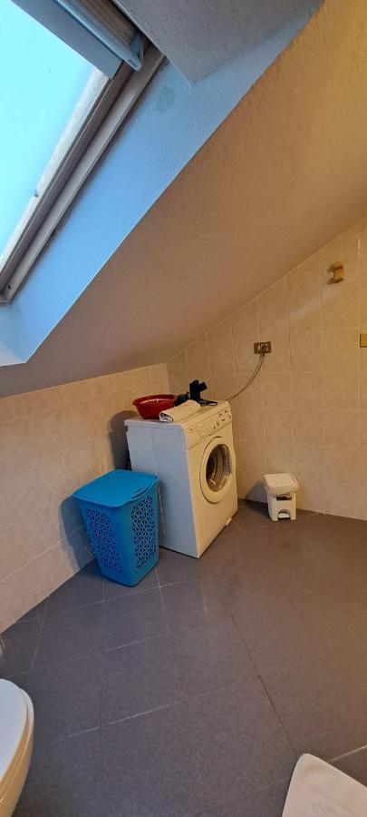 La Mansardina Apartment Vezzi Portio Luaran gambar
