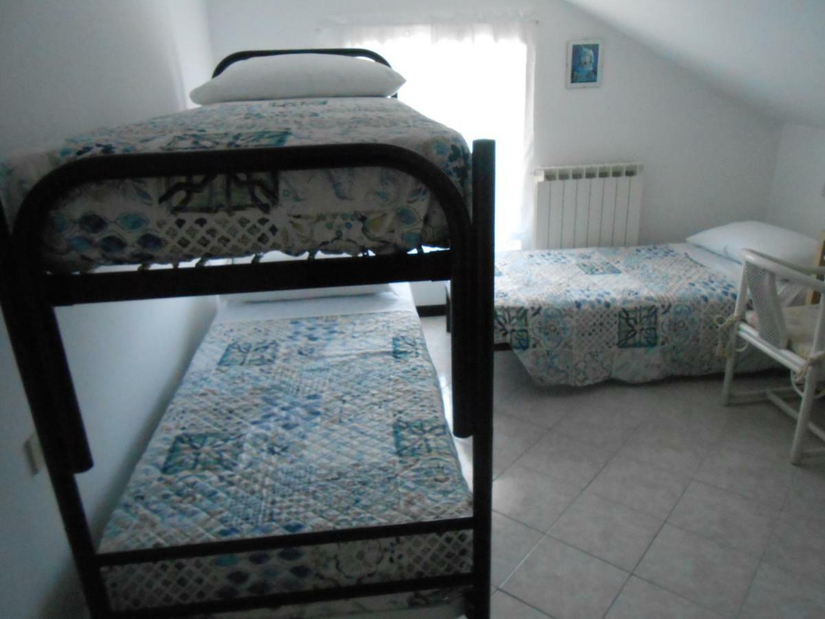 La Mansardina Apartment Vezzi Portio Luaran gambar