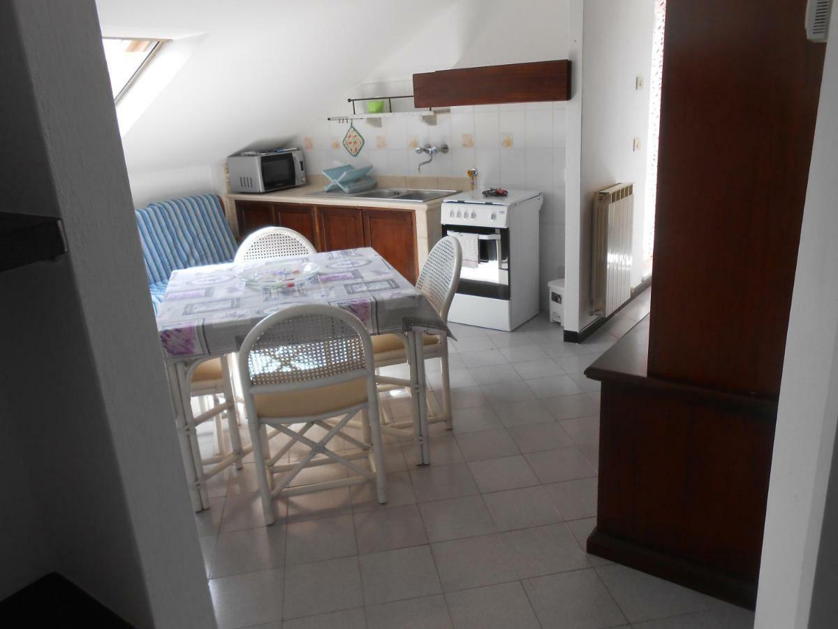 La Mansardina Apartment Vezzi Portio Luaran gambar